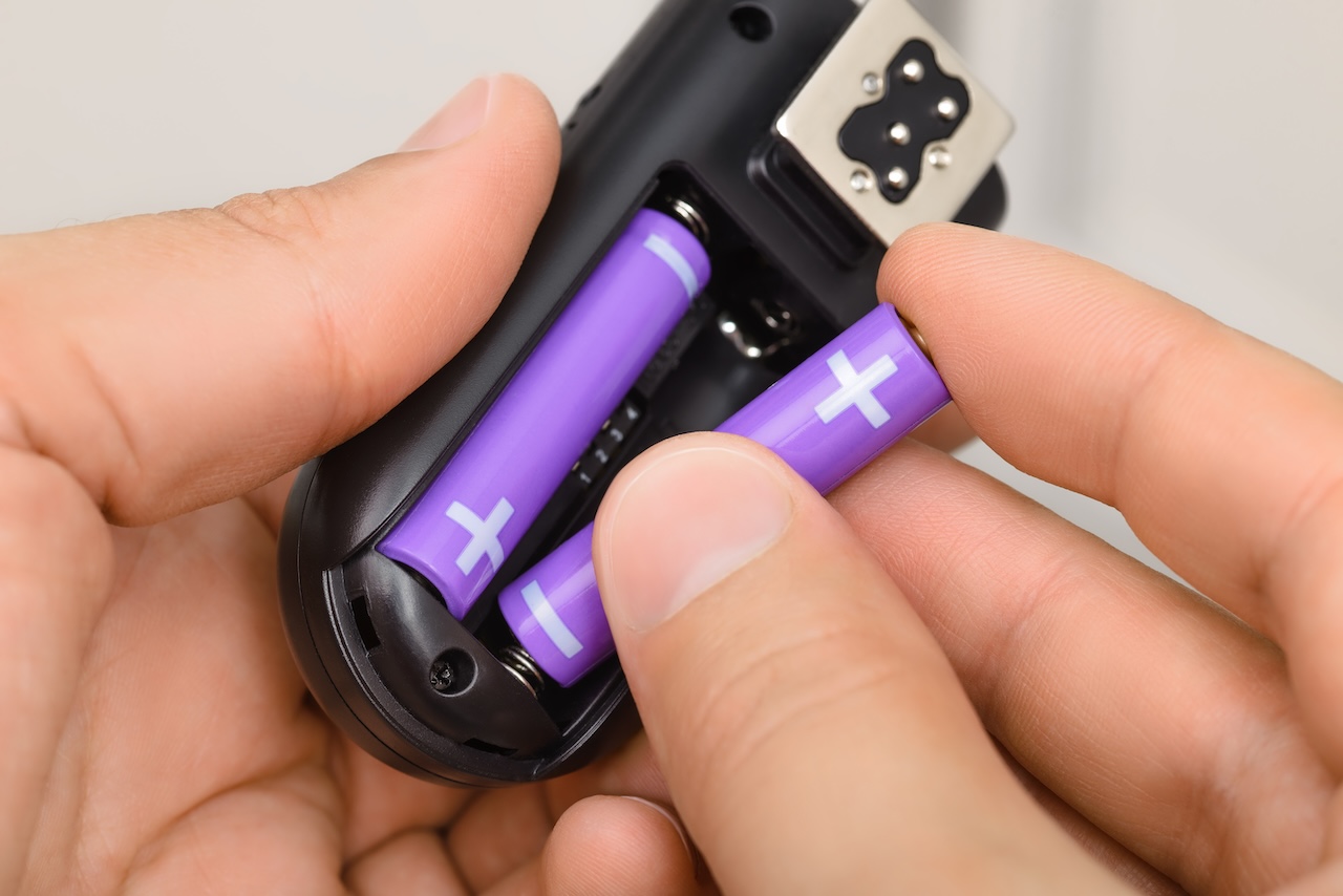 Self Storage person removing batteries before storing electronics